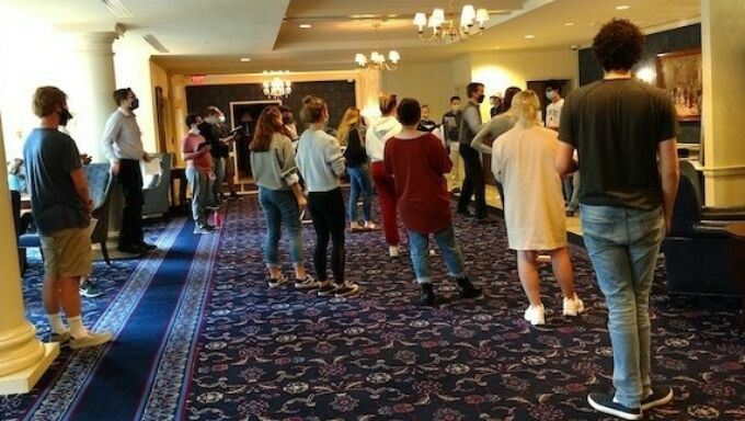 Concert Choir rehearsing at Nittany Lion Inn