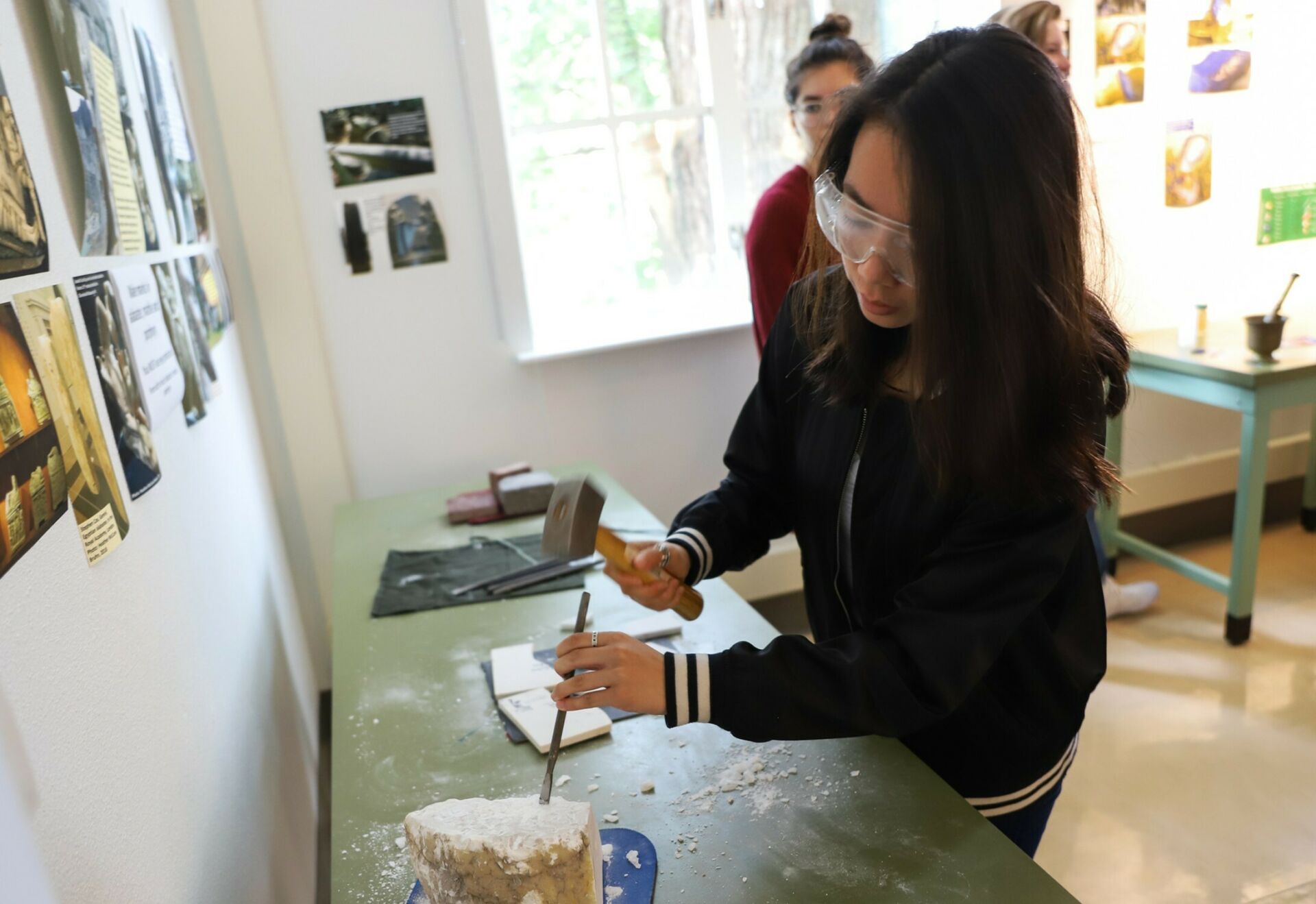 Student participating in the Borland Project Space "Rocks, Minerals and the History of Art" by Heather McCune Bruhn.