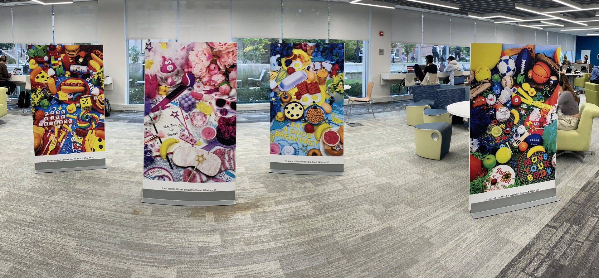 Panoramic image of Graphic Design's Evanisco Project currently on display in the University Park main library