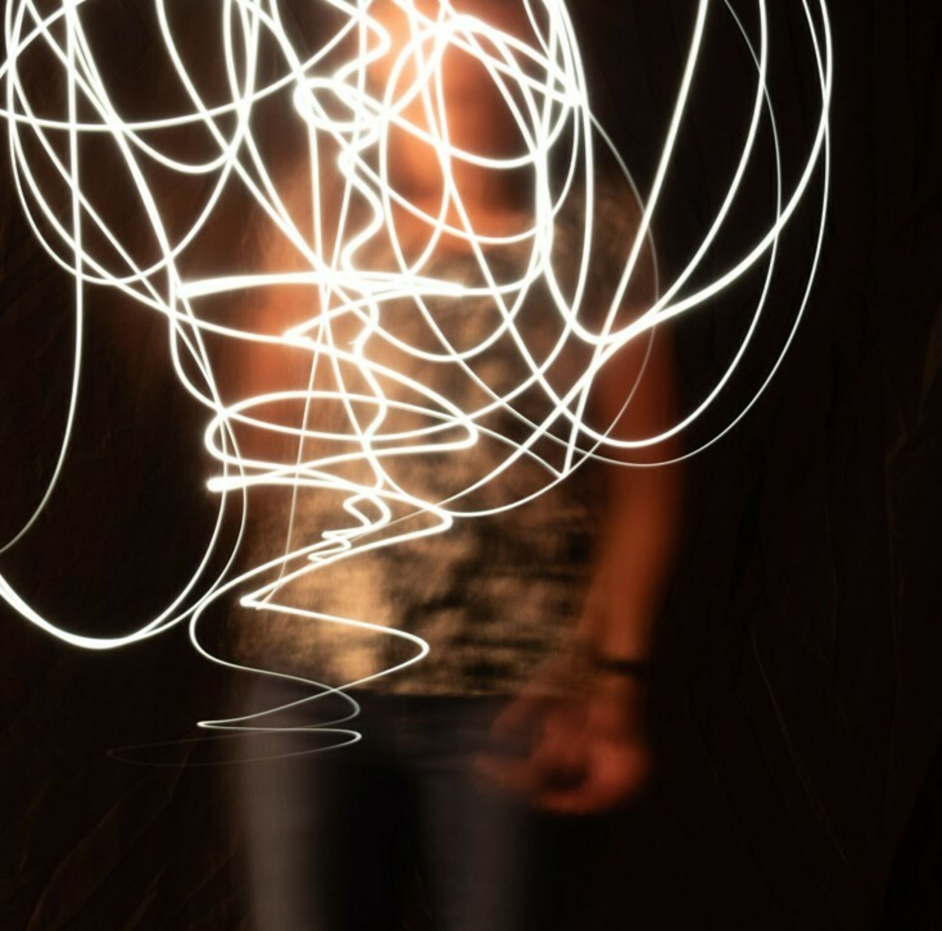 Woskob gallery showcasing interactive light painting by a participant.
