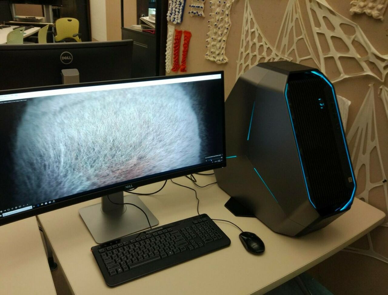 Advanced geometric modeling workstation with curved widescreen monitor in the Penn State SCDC AdvGeomLab