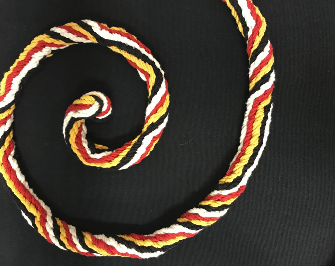 Braided Inca rope arranged in a spiral.