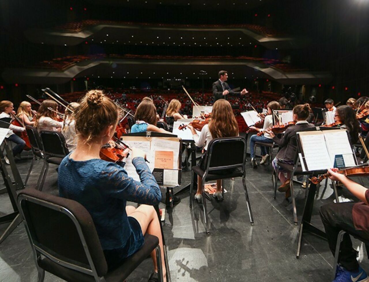Elementary School Students and Penn State School of Music students participate in the tenth anniversary Partners in Music concert.