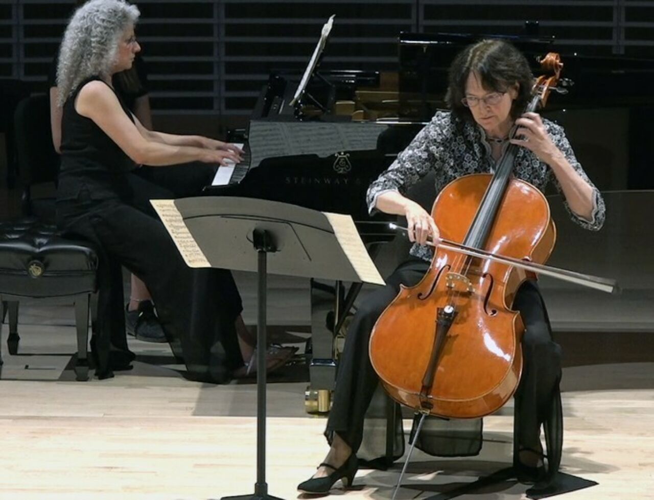 A cellist and a pianist perform on stage in the Penn State Recital Hall as part of the 2019 Penn's Woods Music Festival.