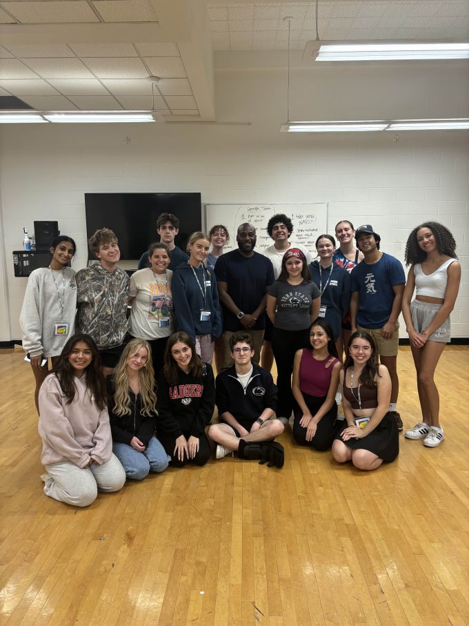 Group of summer theatre students participating in the STATE Musical Theatre training program, take a break in studio and pose for a photograph.