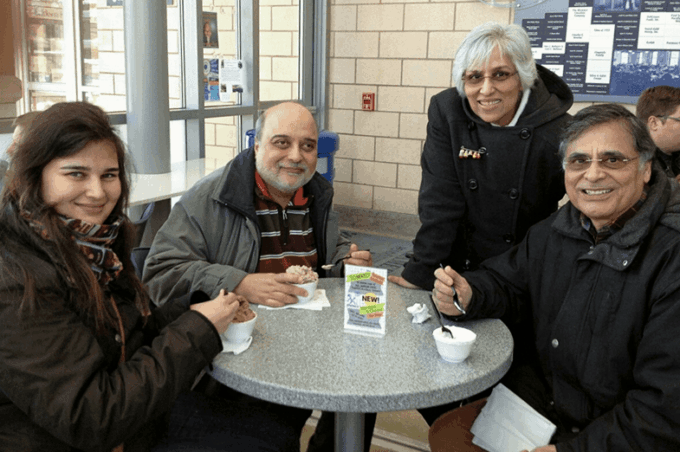 Jawaid Haider with a student's family at the Creamery.