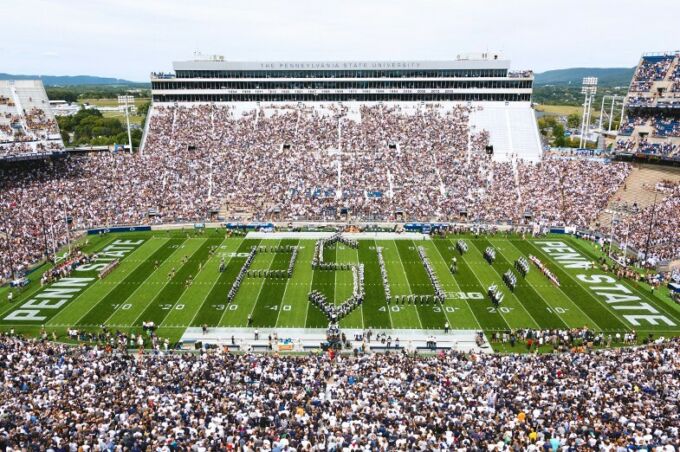 The blue band performing during halftime of a Penn State football game.