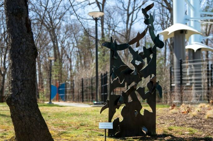 'Transmogrification' metal sculpture by SoVA student Haven Tucker, showcasing birds releasing into flight.