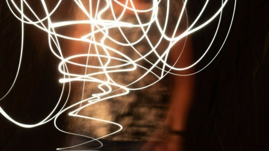 Woskob gallery showcasing interactive light painting by a participant.