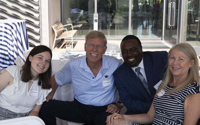 Greg Drane with two donors and an A&A student.