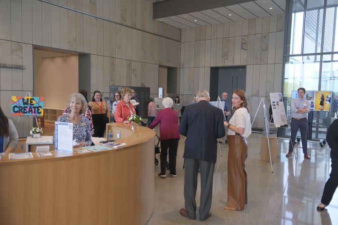 Donor Appreciation attendees socializing in the lobby of the new Palmer Museum of Art