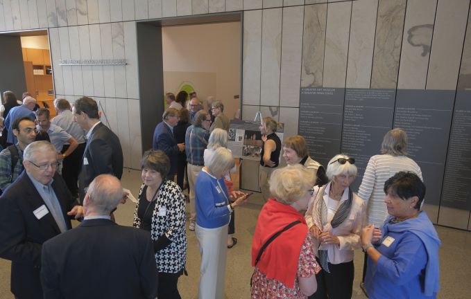 Donor Appreciation attendees socializing in the new Palmer Museum of Art's Dr. Keiko Miwa Ross Lobby.