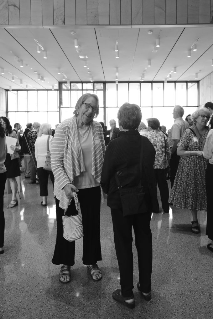 Robin Gibson (left) conversing with Kimberly Schenck (right).