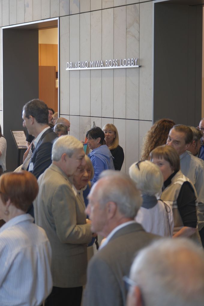 Donor Appreciation attendees socializing in the new Palmer Museum of Art's Dr. Keiko Miwa Ross Lobby.