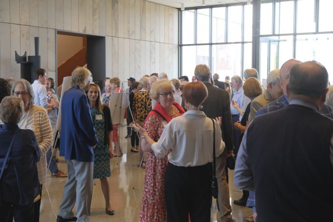 Donor Appreciation attendees socializing in the new Palmer Museum of Art's Dr. Keiko Miwa Ross Lobby.