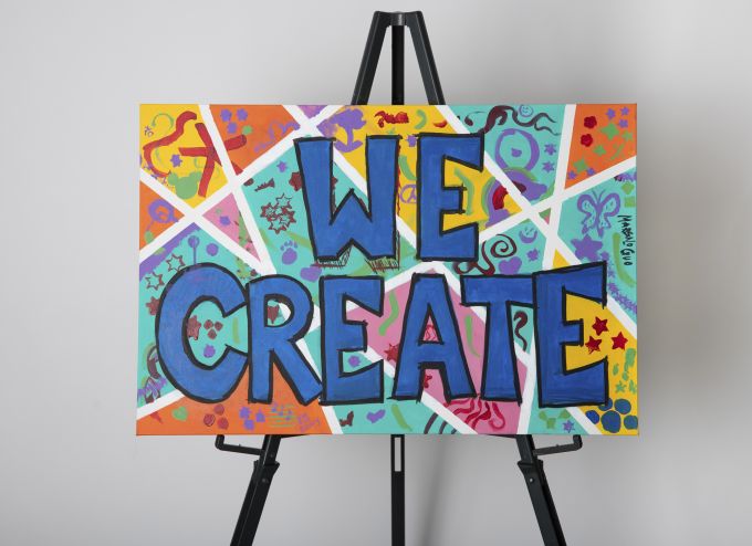 Handpainted "We Create" canvas.