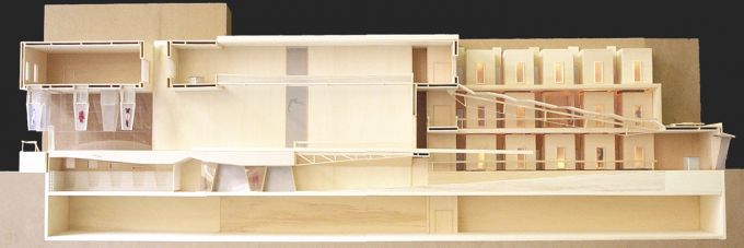 A wooden architectural model of a building