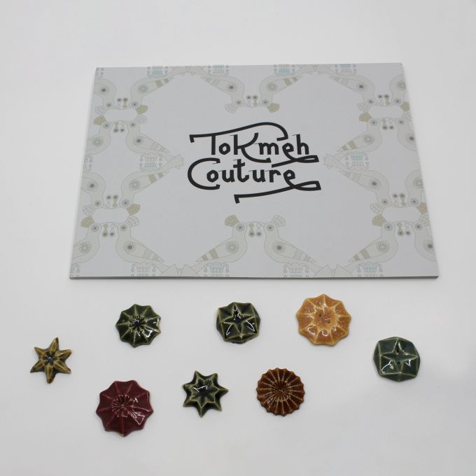 A brochure titled Tokmeh Couture