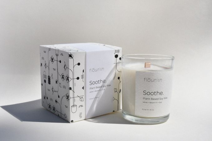 A candle and packaging design for Flourish brand.