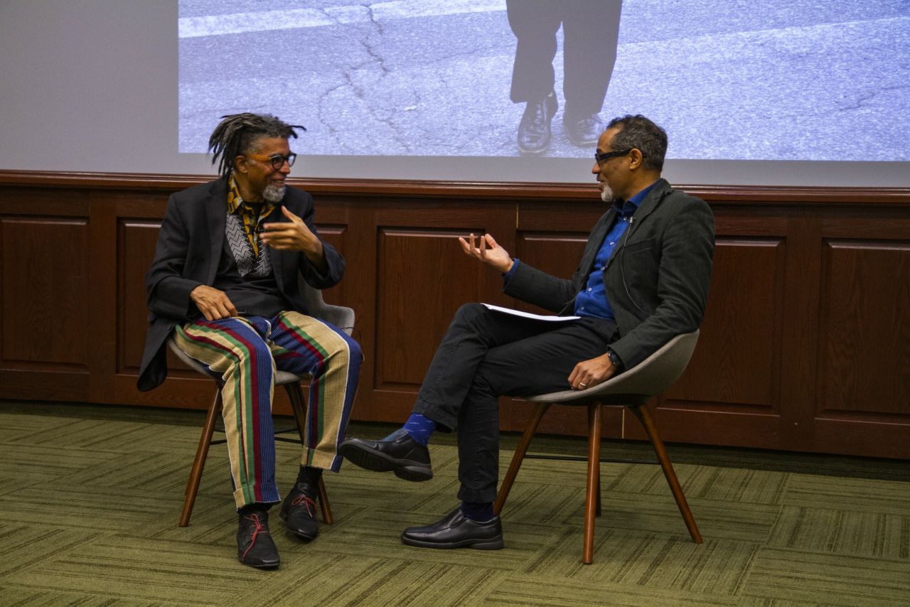 Dread Scott talking to B. Stephen Carpenter II