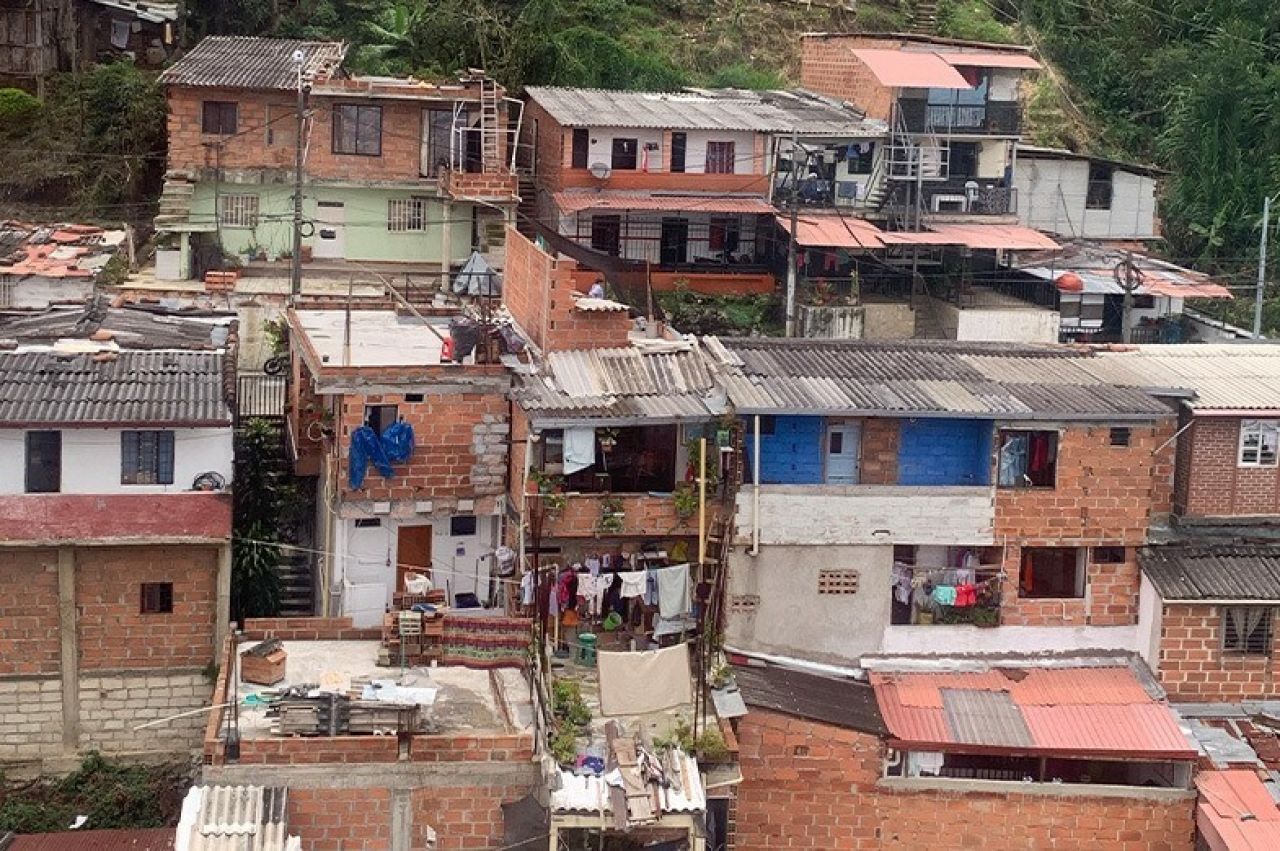 A cluster of houses nearly on top of one another in Medellín, Colombia.