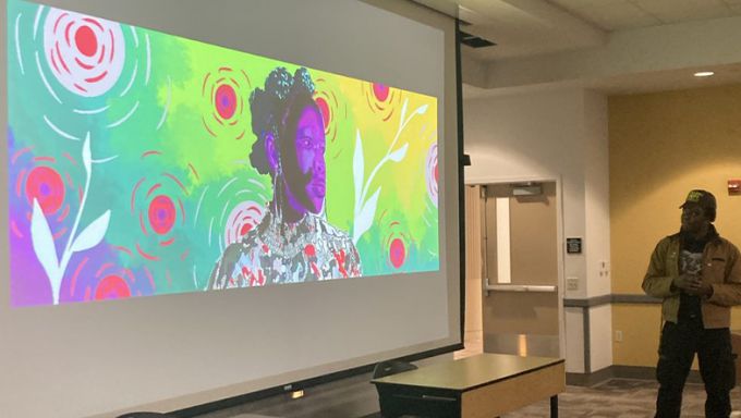 Projector screen with graphic image with vibrant colors of a black person's profile