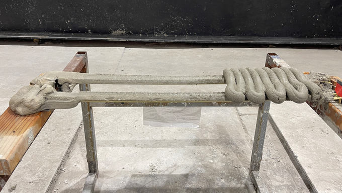 Freshly extruded 3D printed concrete.