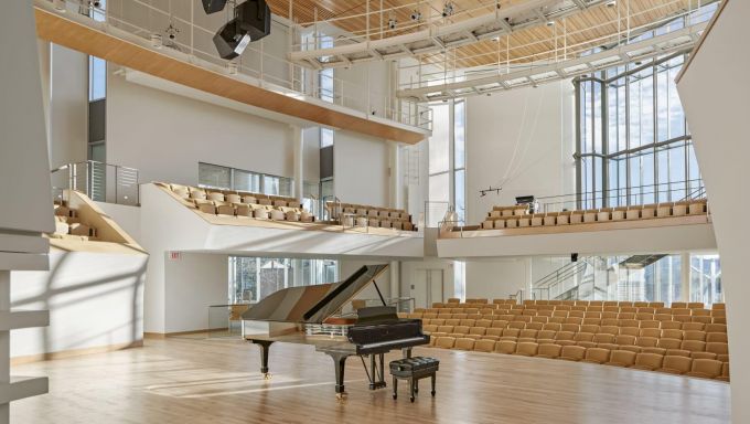 Grand piano on the stage of a recital hall