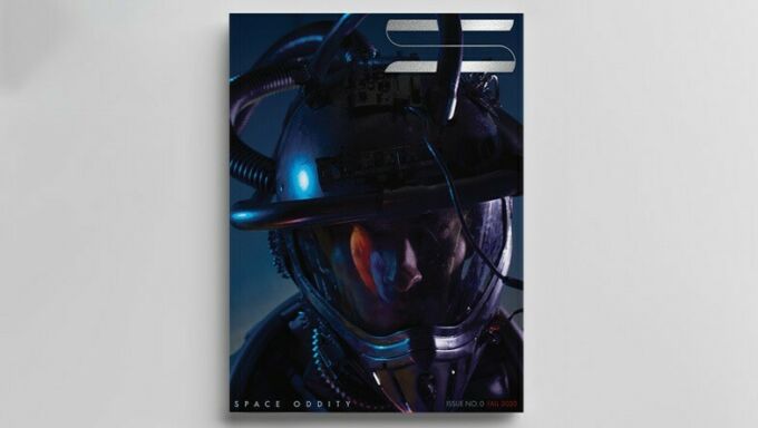 The cover of Space Oddity magazine featuring a darkened closeup of a man's face in a space suit.