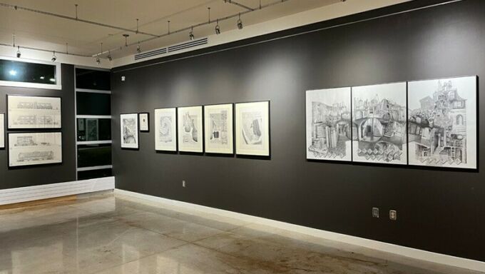 Architectural drawings on the wall of the Rouse Gallery.