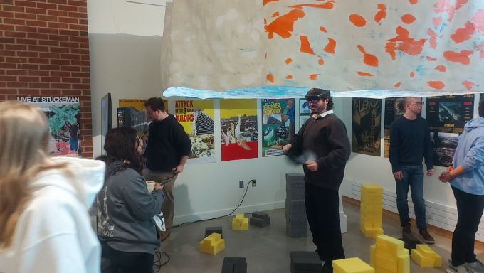 Students exploring a mixed reality exhibition.