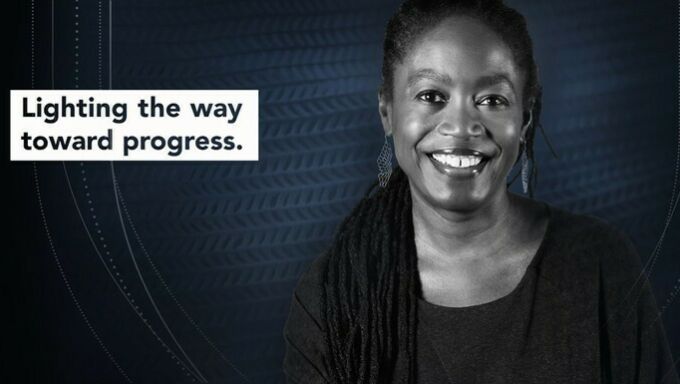 An image of Felicia Davis with a block caption to the left of her stating Lighting the way toward progress.