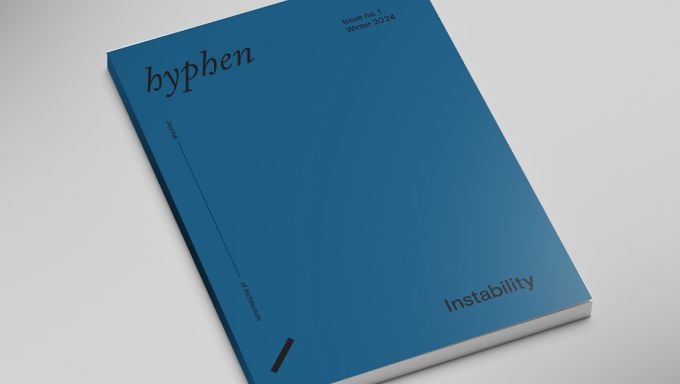 The blue cover of the Hyphen journal.