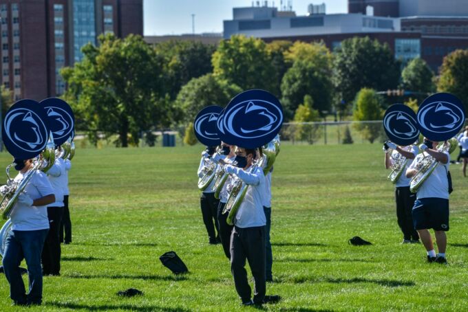 Blue Band tuba players wearing special masks that still allow them to play their instruments