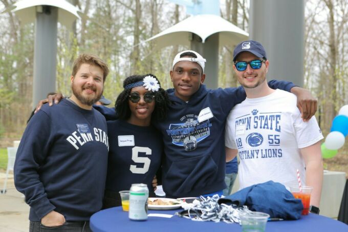 Young alumni at tailgate