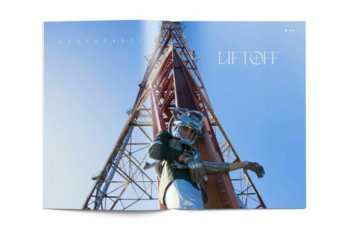 A magazine spread of a man in space suit on a launch pad with the word liftoff in white.
