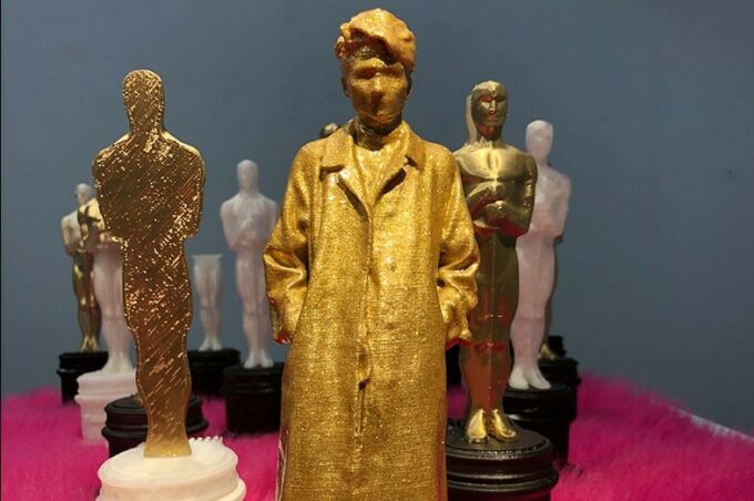 A gold statue that resembles Leo Wang in his FlamBOYant show.