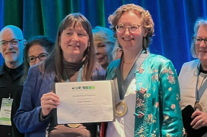 Roxi Thoren, at right, accepting a medal and certificate as she was inducted into the Council of Educators in Landscape Architecture Academy of Fellows from Terry Clements, chair of the CELA Academy of Fellows..