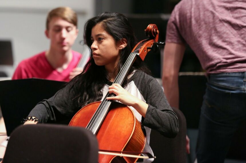 Female student playing cello