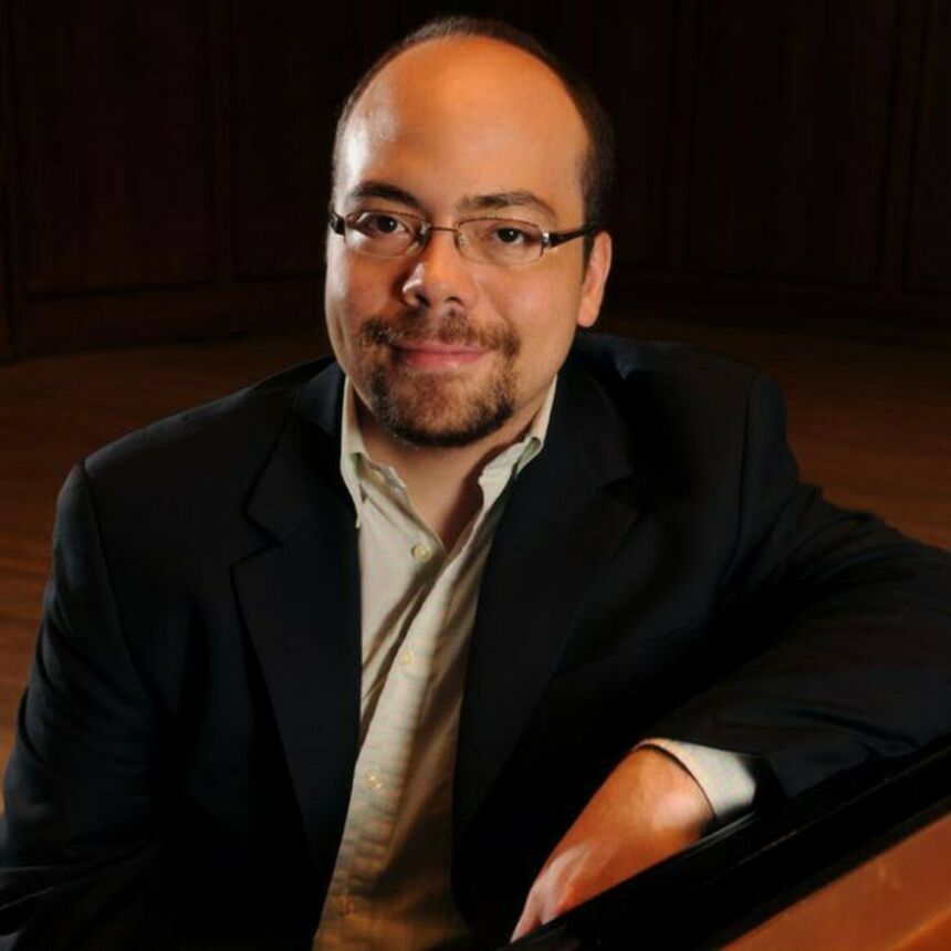 Headshot of Penn State Associate Professor of Piano Christopher Guzman