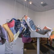 Fabric installation suspended from the Woskob Family Gallery's ceiling.