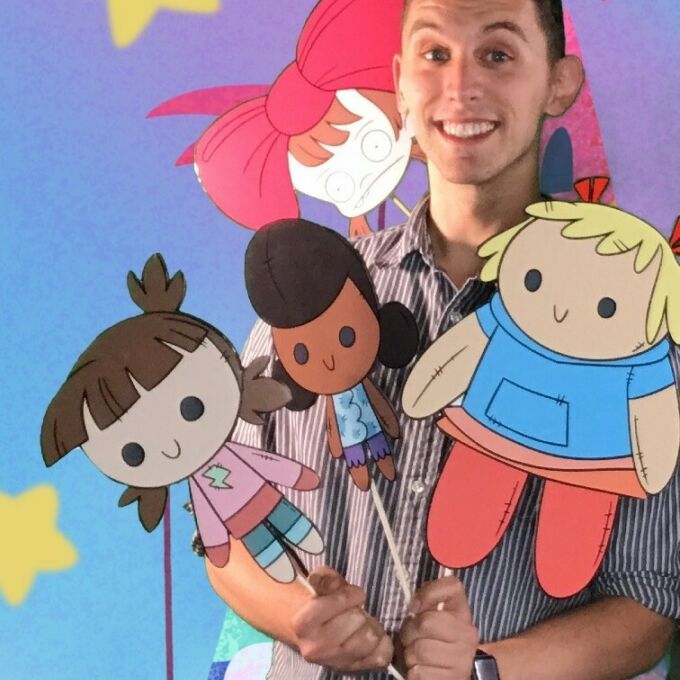 DreamWorks animatic editor Caleb Yoder pictured with characters from Harvey Street Kids