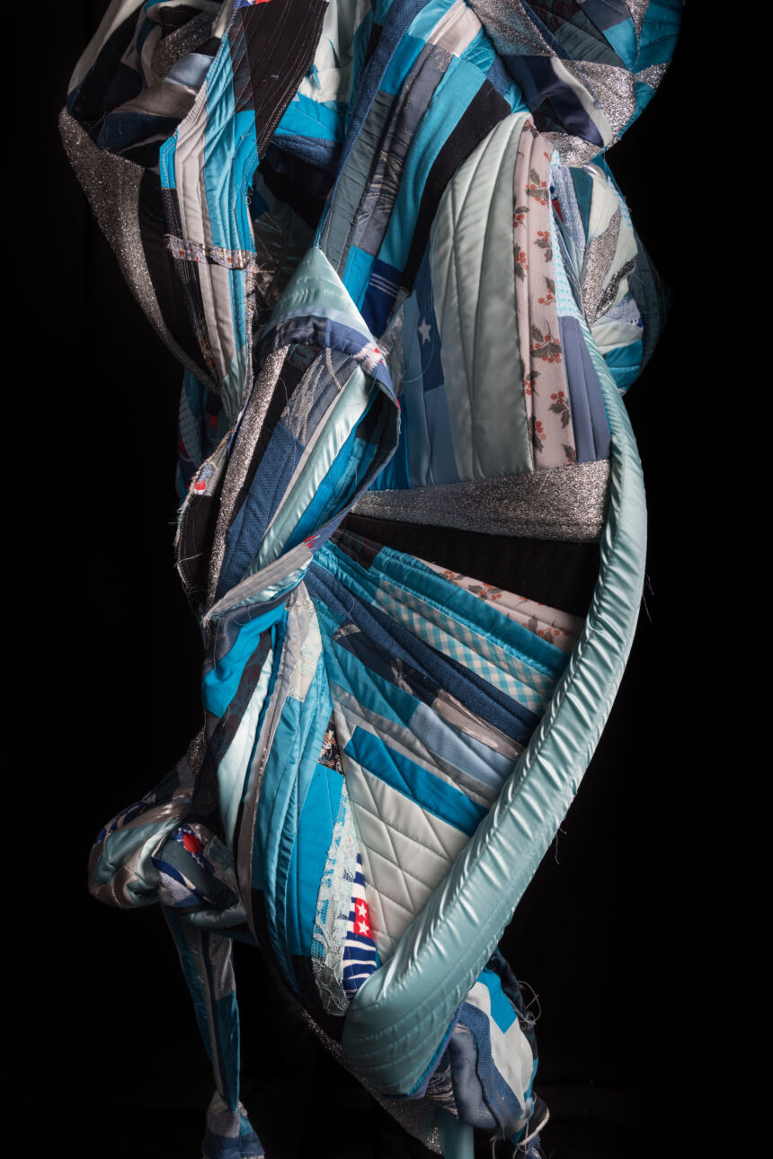 "Color Code: Guardian Blue (detail)," by Bonnie Collura, 2018. Made from repurposed cloth, thread, zippers.