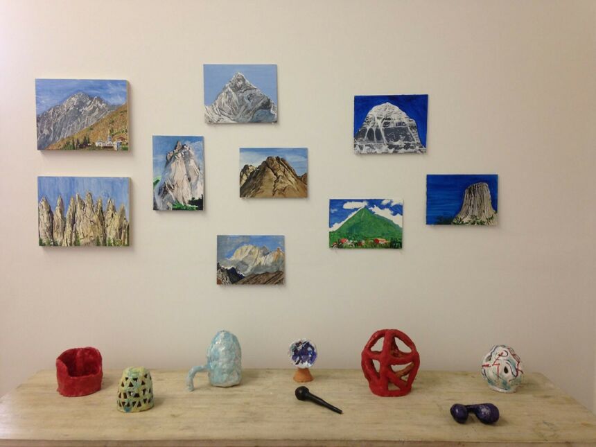 Gallery featuring artist Rudy Shepherd's Holy Mountain paintings and mini sculptures.