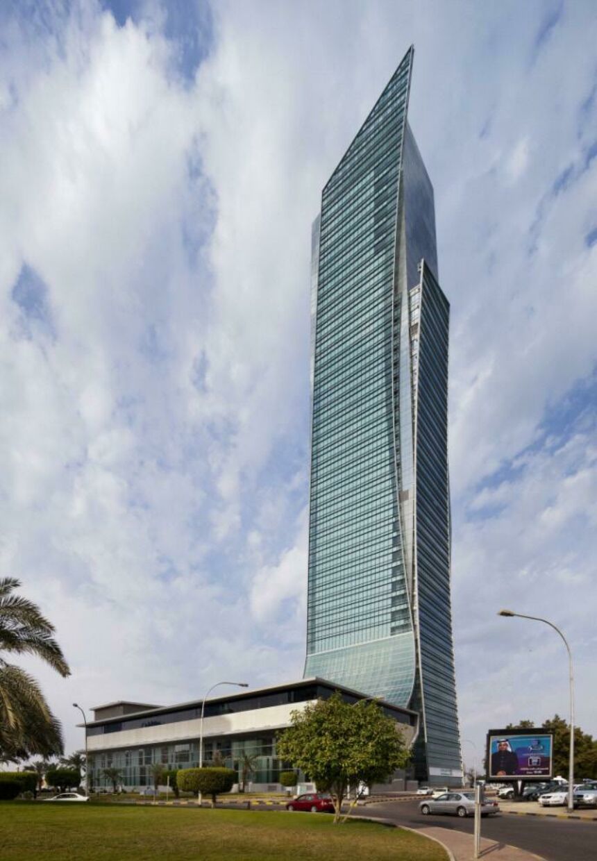 Exterior shot of a recently completed glass-paneled skyscraper in Kuwait City, Kuwait.